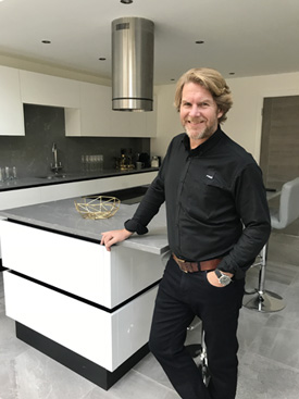 Leigh Price,  Co-Director of Real Stone & Tile, in one of the kitchens at the Mere View development in Astbury, near Congleton.